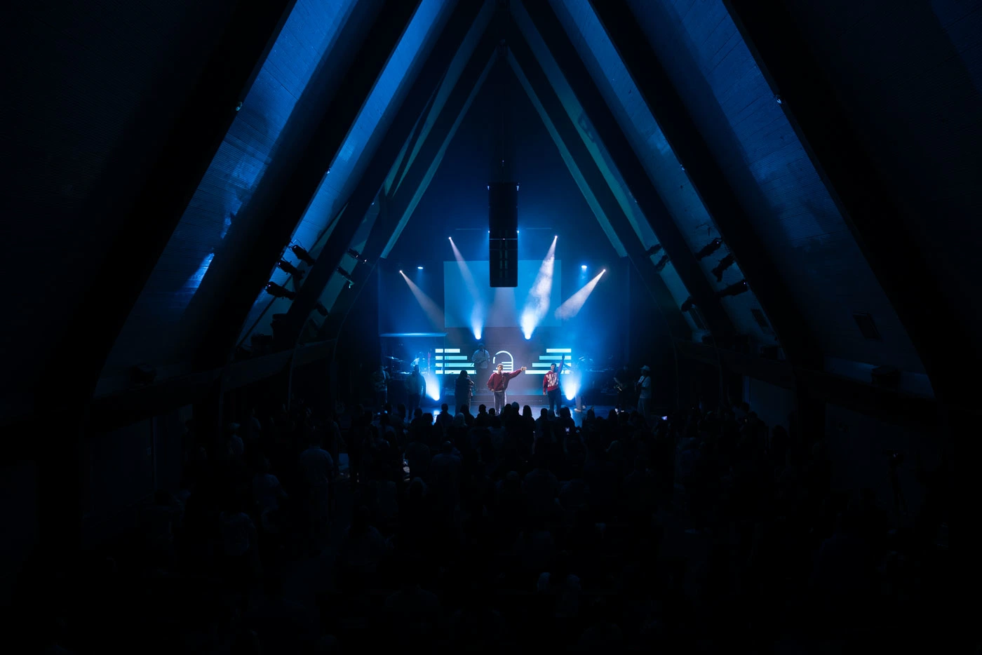 Young adults worshiping together at an EGYA gathering