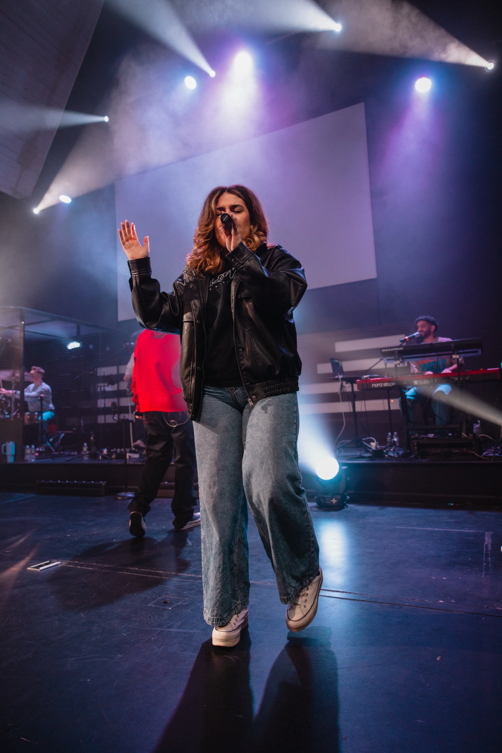 A vocalist leading an EGYA worship night